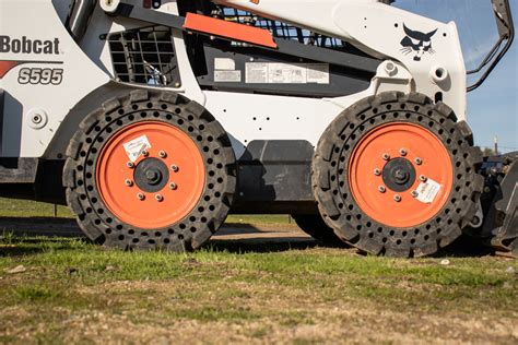 turf tires for skid steer|skid steer turf vs solid.